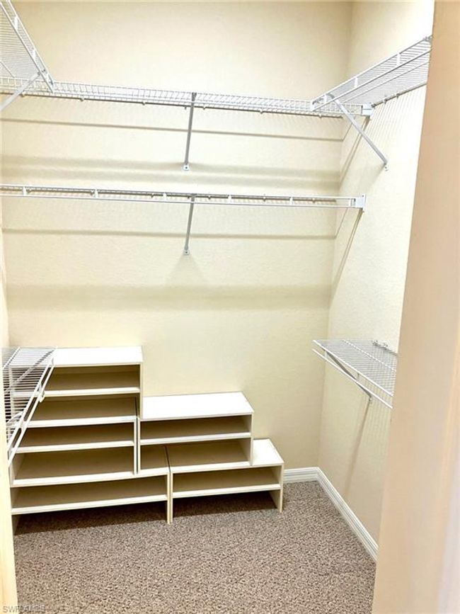 Primary walk in closet | Image 15