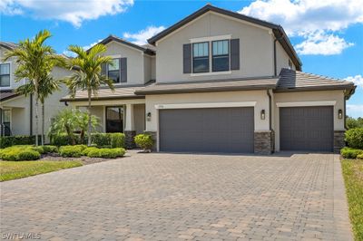 View of front of property with a garage | Image 2