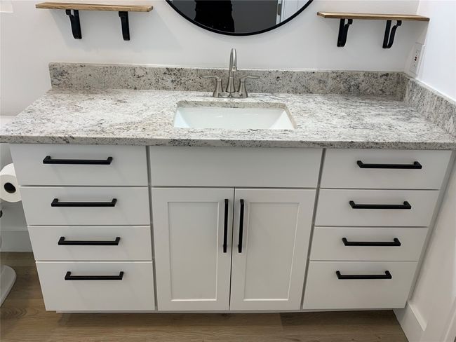 Bathroom featuring vanity and wood finished floors | Image 14