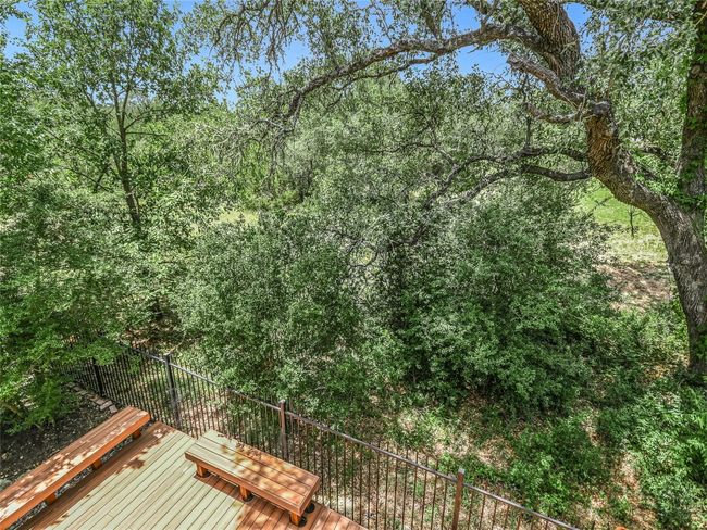 A view of the side green space from your balcony enhances your privacy and natural beauty. | Image 26