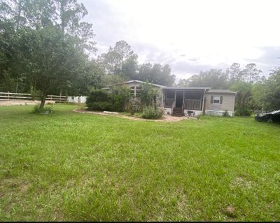 6805 Sugarbush Lane, House other with 4 bedrooms, 3 bathrooms and null parking in Polk City FL | Image 1