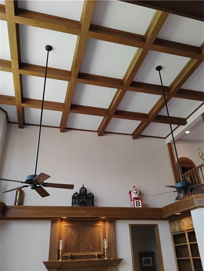 Room details featuring coffered ceiling, a ceiling fan, and beam ceiling | Image 23