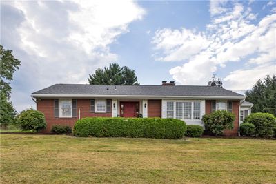 Level Entry, Picturesque, and Classic Brick Front Ranch. | Image 1