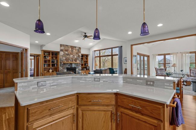 Kitchen view of living room & sun room | Image 4