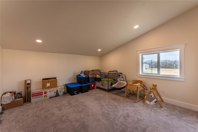 Game room with vaulted ceiling, carpet, and recessed lighting | Image 19