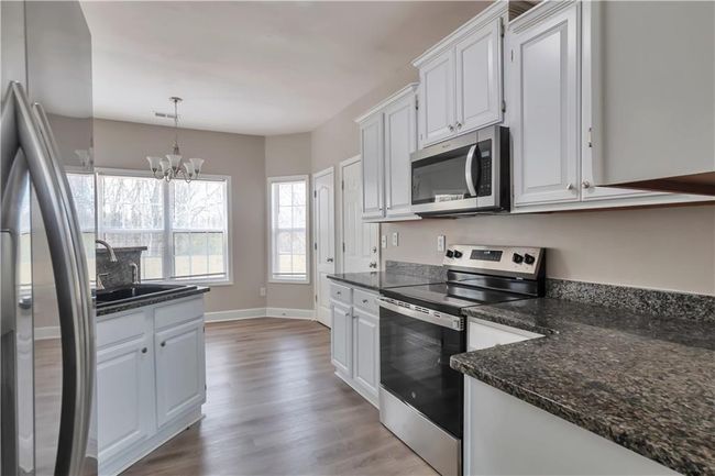 1215 Bridge Crest Dr, House other with 4 bedrooms, 3 bathrooms and null parking in Winder GA | Image 4