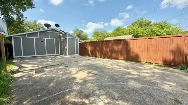 Fenced backyard featuring a patio area | Image 36