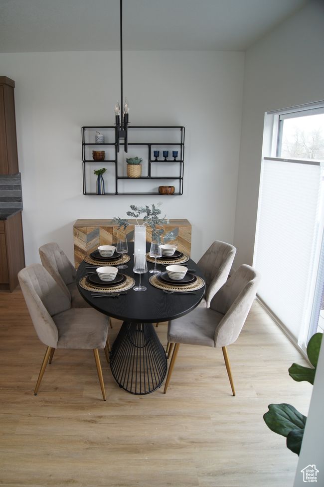 Dining space featuring light wood-style floors | Image 5