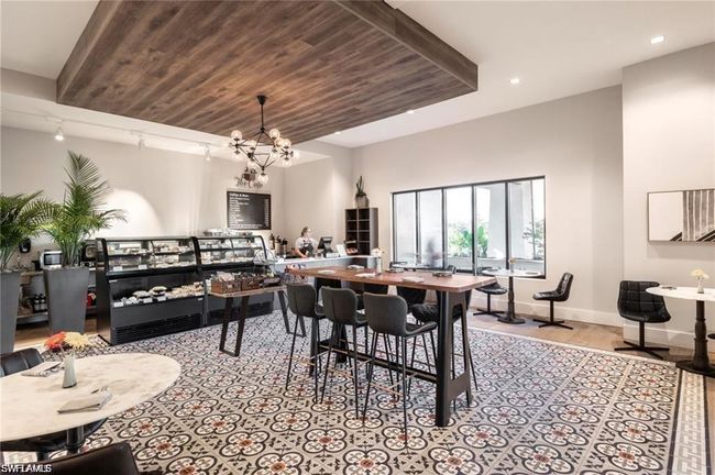 Dining room featuring a chandelier, recessed lighting, and wooden ceiling | Image 39