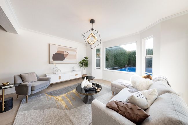 Living area featuring baseboards, wood finished floors, and ornamental molding | Image 20