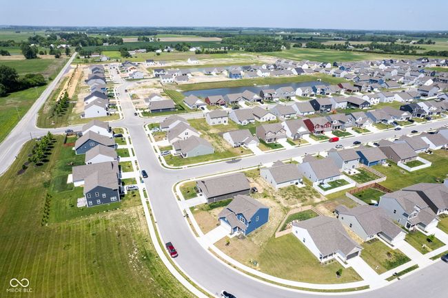 aerial view of property's location featuring nearby suburban area and a large body of water | Image 38