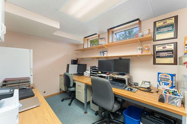 A few steps lower to a private office space. | Image 28