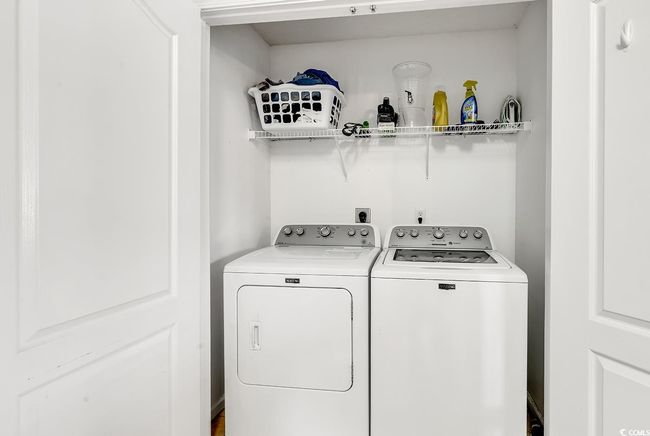Washroom featuring washing machine and dryer | Image 19