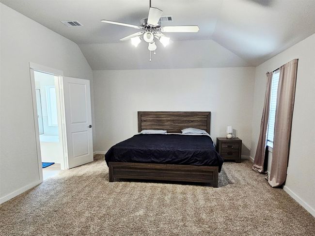 Primary bedroom is huge and can handle any size bed and seating arrangement | Image 13