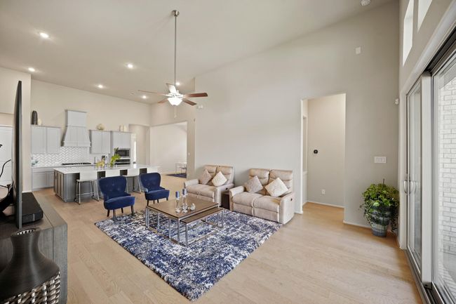 Another view of the bright andspacious living room. | Image 17