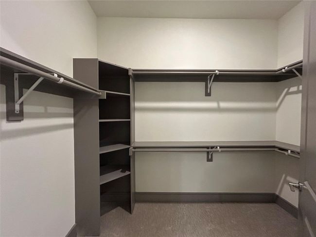 View of walk in closet | Image 18