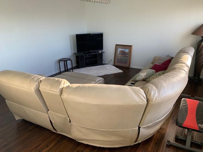 Living room with baseboards and wood finished floors | Image 19