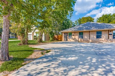 View of front of home featuring a front lawn-4021 E. 1st | Image 1