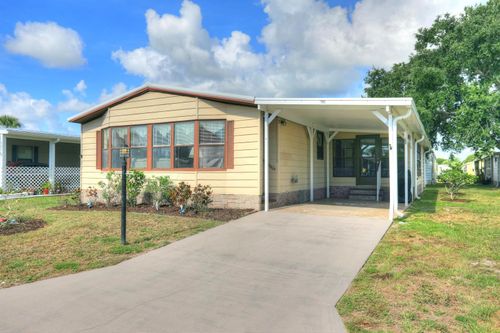 705 Hyacinth Cir, Barefoot Bay, FL, 32976-7664 | Card Image