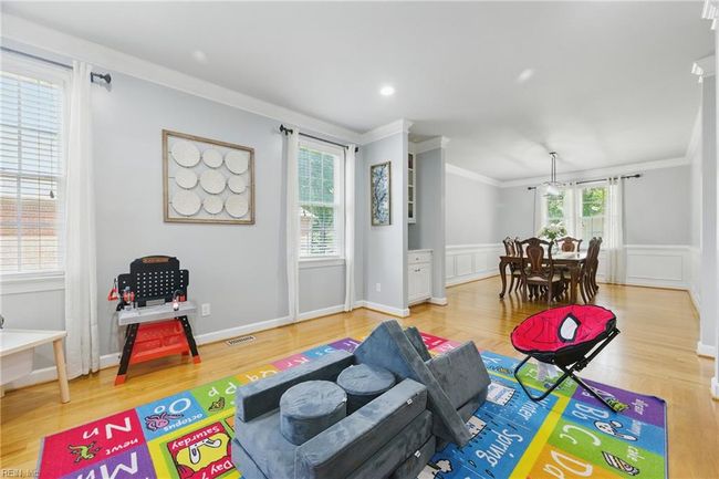 The Formal Living Room is located at the front-left of the home and elegantly flows to the Formal Dining Room.... | Image 14