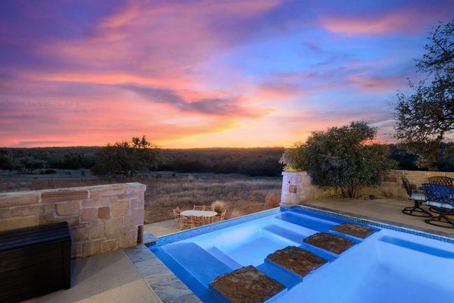 Huge infinity pool with Hill Country views | Image 53