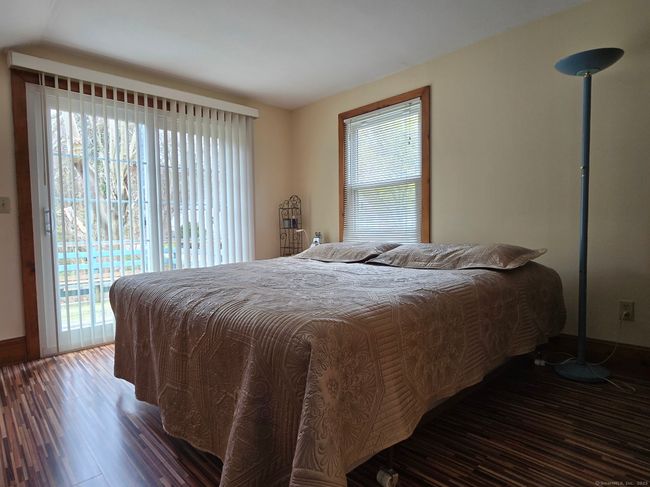 bedroom showing the sliders | Image 7
