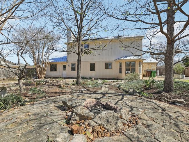 Back of property with fence and metal roof | Image 34
