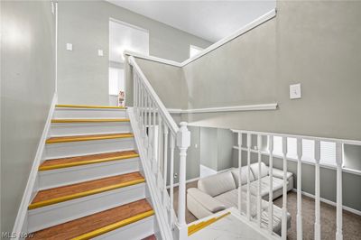 Staircase with carpet flooring | Image 3