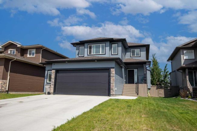 11310 62 Ave, House detached with 3 bedrooms, 2 bathrooms and 4 parking in Grande Prairie AB | Image 1