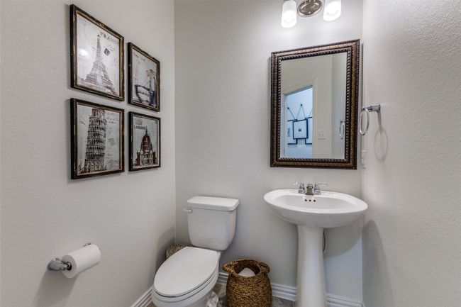 Powder room off the front hallway. | Image 6