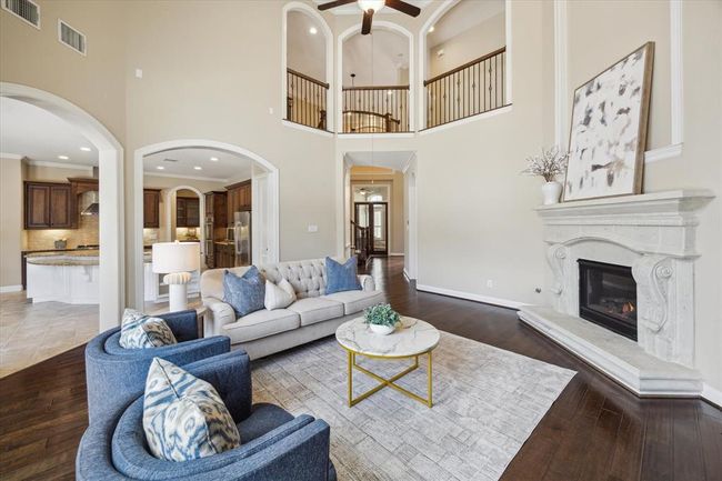 Another fantastic view of the main living area with a sneak peak of the enormous gourmet kitchen | Image 14