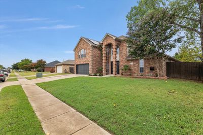 View of front property featuring a garage and a front lawn | Image 3