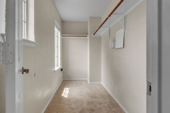 Spacious walk in closet with beautiful natural light | Image 7