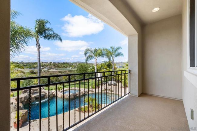 Private patio off the primary bedroom. | Image 11