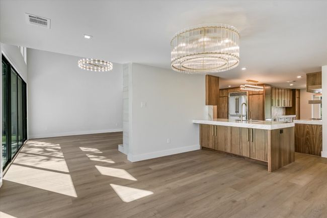 Bar seating overlooking kitchen counter | Image 5