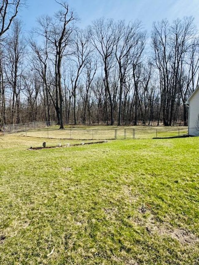 Large fenced backyard to keep kids and pets safe | Image 26