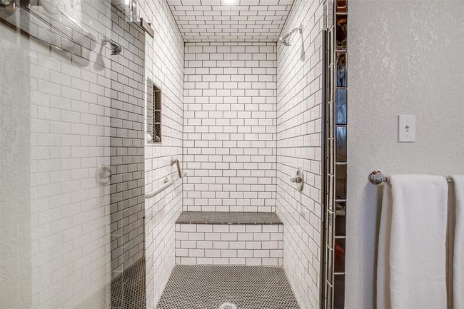 Custom subway tiled walk-in shower with bench | Image 22
