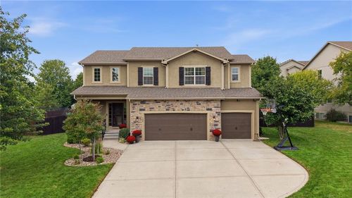 104 S Eastglen Dr, Raymore, MO, 64083-8615 | Card Image