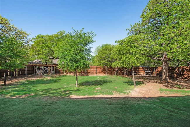 View of yard with a fenced backyard and a gazebo | Image 32