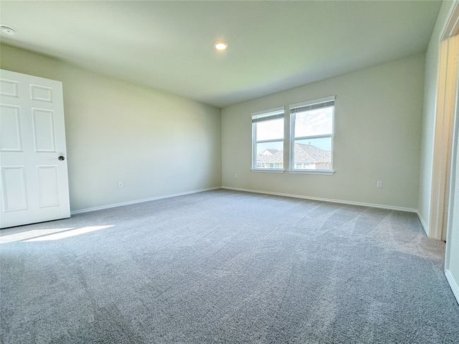 Spare room featuring carpet floors, baseboards, and recessed lighting | Image 15