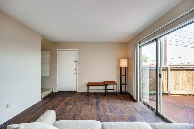 Living area with hardwood / wood-style flooring and baseboards | Image 4