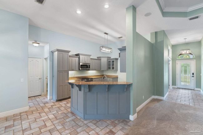 7008 Turnberry Cir, House other with 4 bedrooms, 2 bathrooms and 3 parking in Navarre FL | Image 24