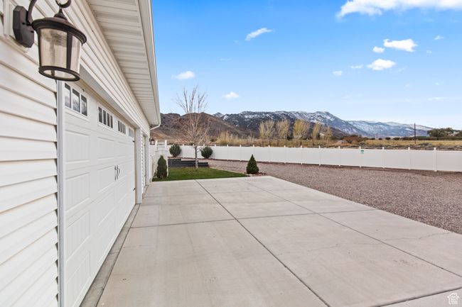 View of patio featuring a mountain view | Image 6