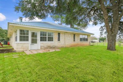 An enclosed porch leading you to your outdoor oasis! | Image 3