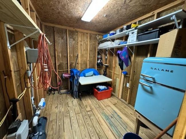 This well-equipped boathouse features a water pump for efficient irrigation, offering both functionality and convenience. | Image 41