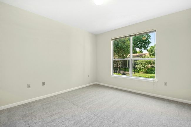 Unfurnished room featuring baseboards and carpet floors | Image 16
