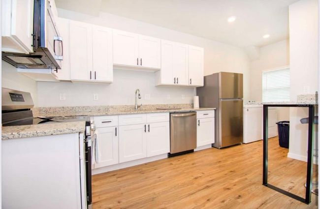 1933 Oxnard Ct, Townhouse with 3 bedrooms, 3 bathrooms and null parking in TAMPA FL | Image 4
