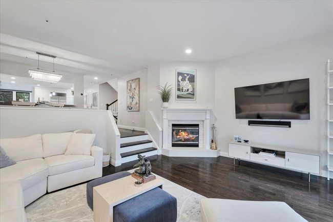 Bright and light living room with fireplace | Image 4