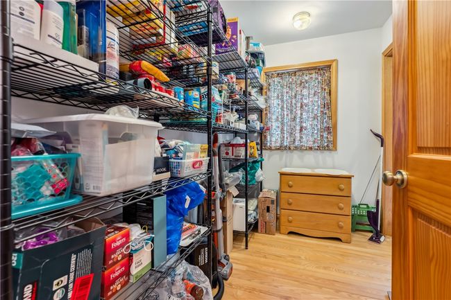 Pantry area with access to main level laundry | Image 25