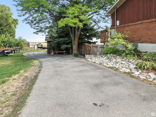 View of asphalt driveway | Image 34